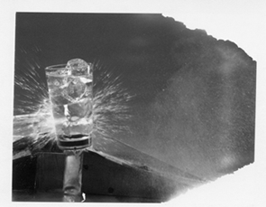 Polaroid, photography, studio photography, set design, art direction, a photo of a water glass getting hit with water from behind